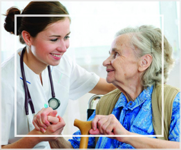Image: doctor looking after elderly person.