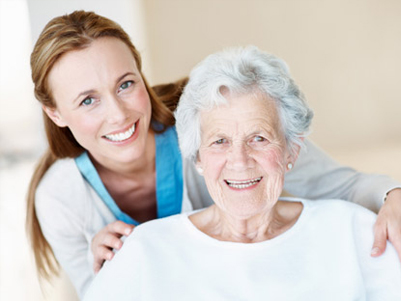 Image: nurse looking after patient.
